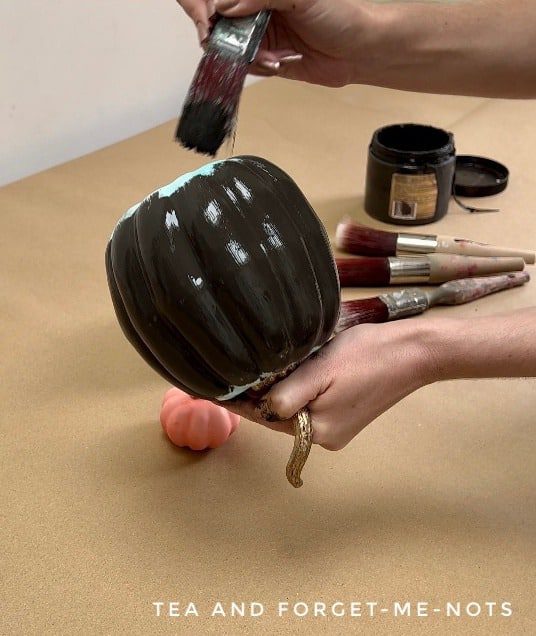Pumpkins Being Painted with Dixie Belle Paint in Coffee Bean Color